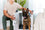 dog standing inside of their white high anxiety dog crate